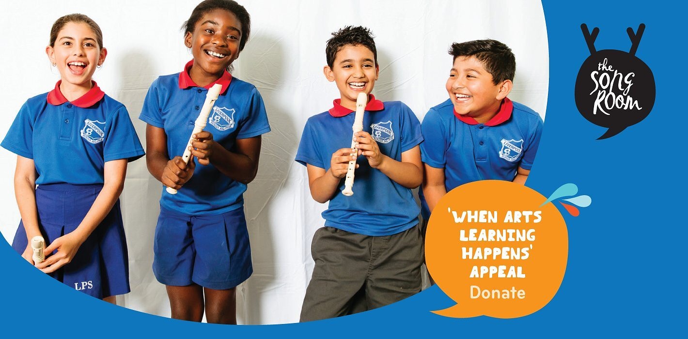 primary school students playing recorders with When arts learning happens appeal written