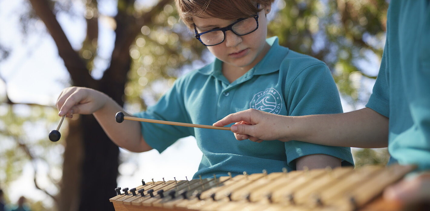 primary school students in arts learning music lessons formative assessment on glockenspiel 