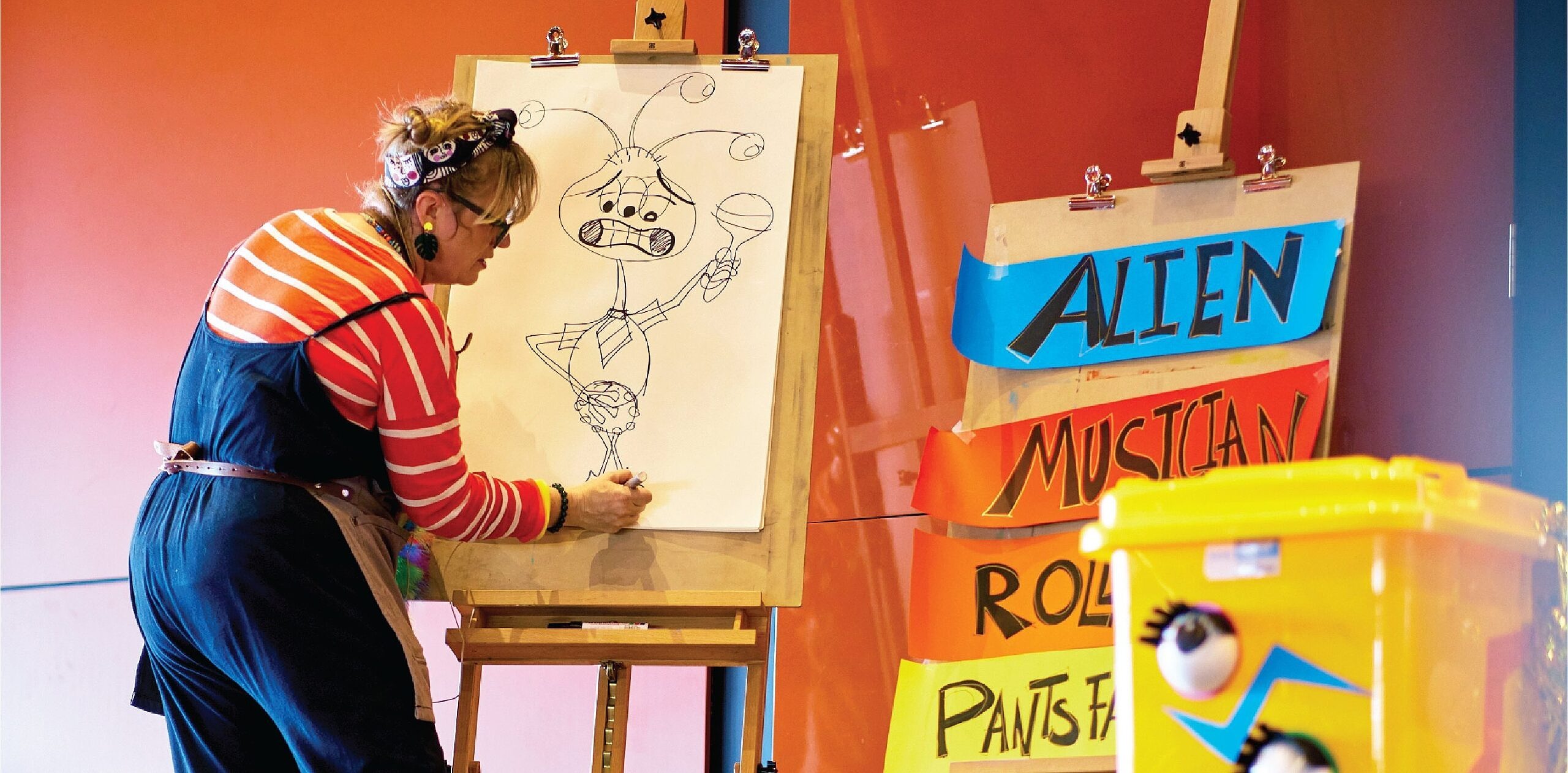 Geelong illustrator, Kat Rattray, creates drawings with the help of students at Geelong’s Big Day of Learning.
