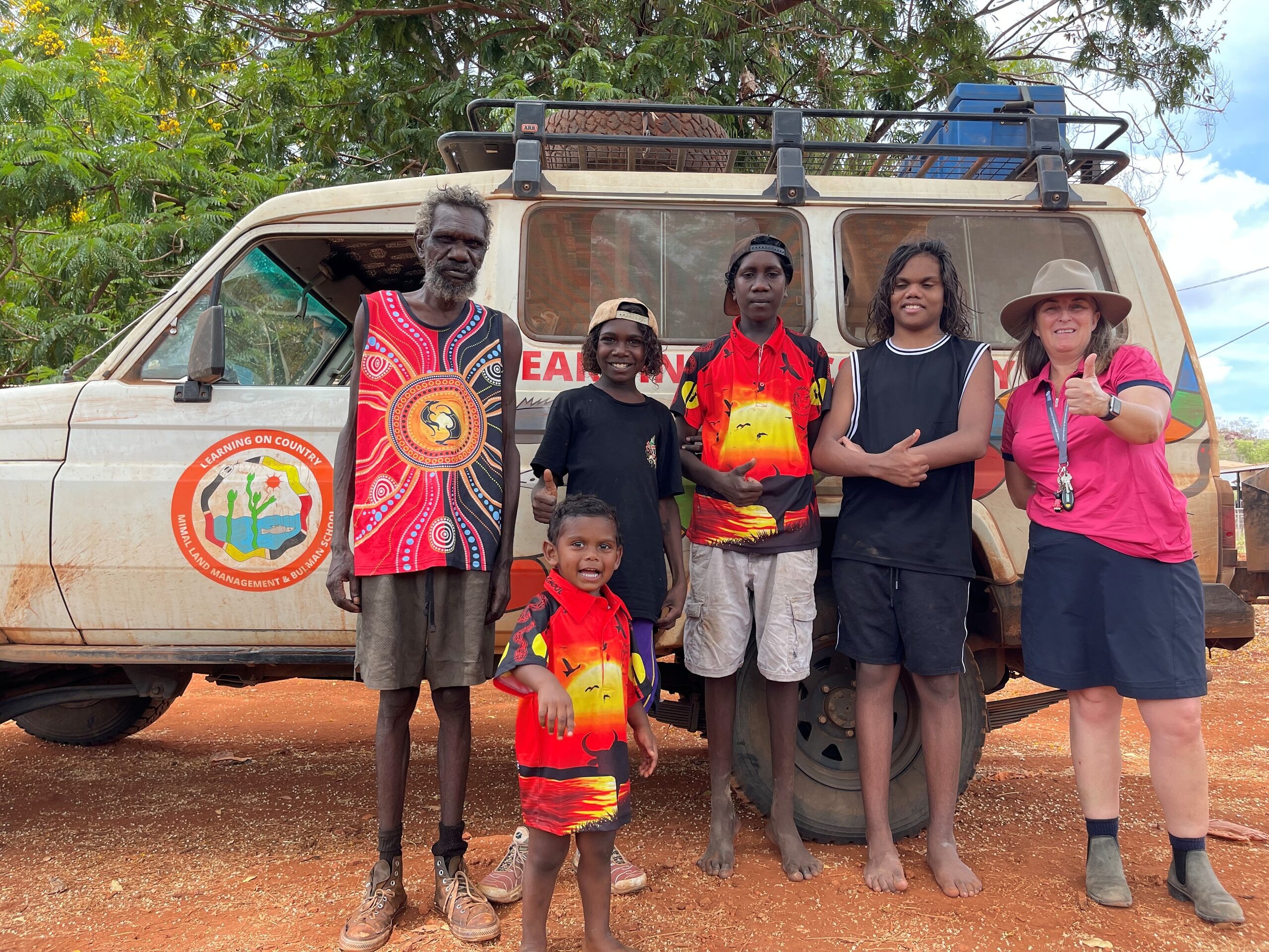 Senior Language Expert, Randall Campion with principal Michelle Jensen and students from Bulman School, who are using music to learn traditional languages