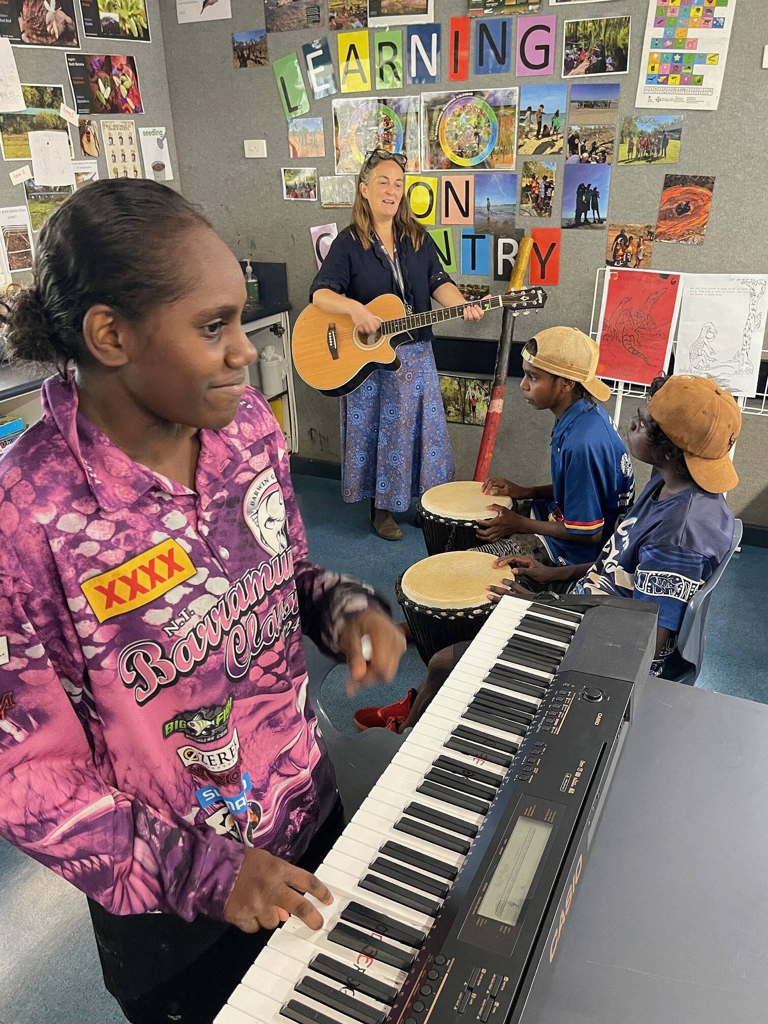 Bulman School Principal Michelle Jensen with students in music class through The Song Room music program.
