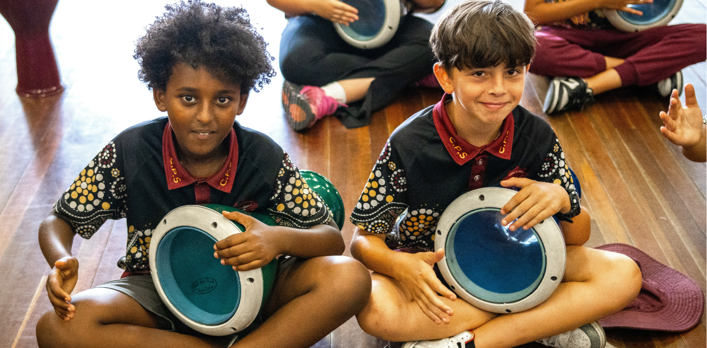 The beat goes on! Students enjoying a Music Education session, learning rhythm and collaboration through drumming as part of our Arts Education Australia program.
