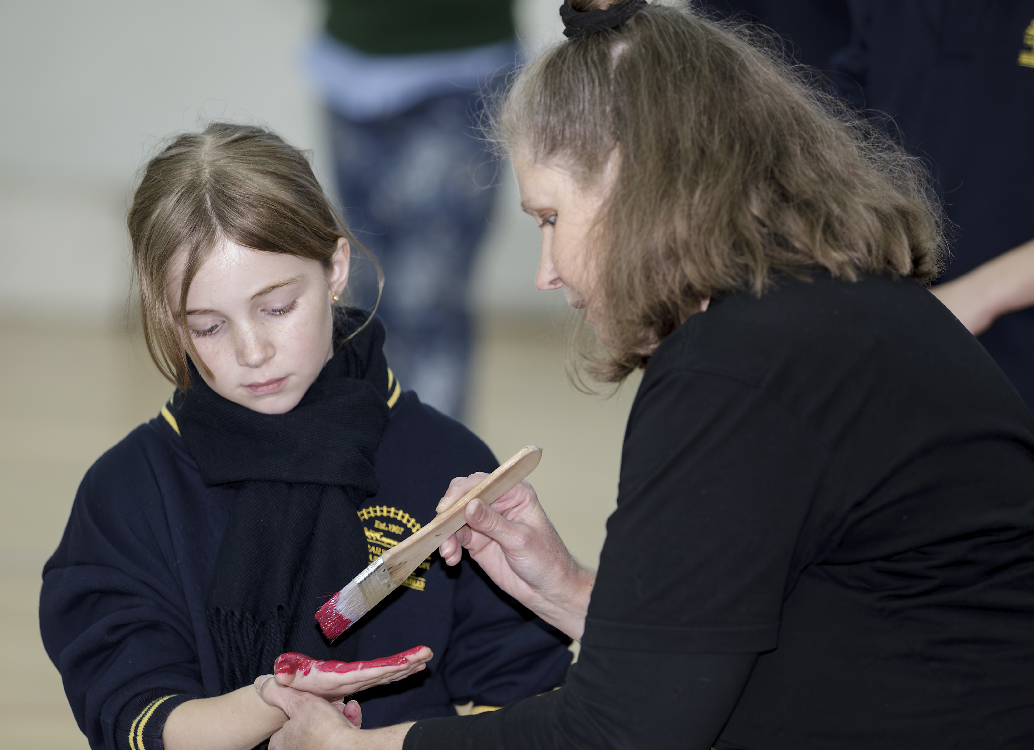 First Nations Arts Educator Aunty Sammy Trist leading a painting session as part of the Deadly Arts programme, a model for culturally safe and place-responsive pedagogy.