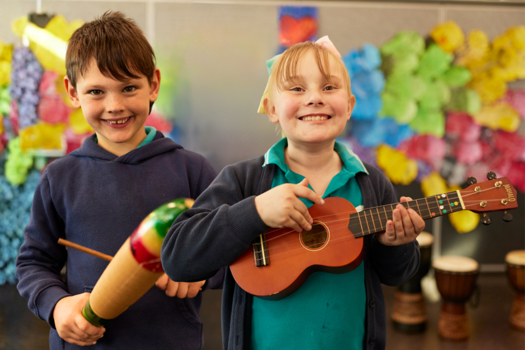 Support The Song Room. Children with instruments for Don't Miss a Beat appeal 
